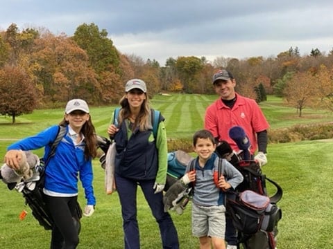 Family playing golf at Newtown Country Club. Family friend country club located in Newtown, Connecticut.